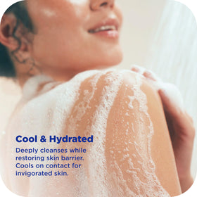 OLLY person using COOL body wash in shower to show refreshing post-workout revival benefit