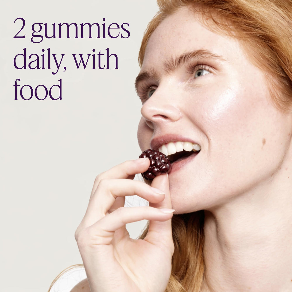 OMI two gummies on a spoon, easy two-per-day dosing benefit