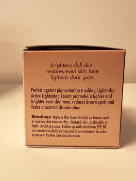 OMIC Lighten-Up 100 ml jar beside ruler to show product size and travel-friendly benefit