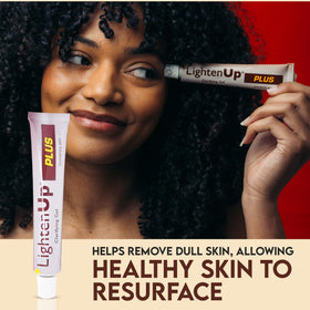 Spreading OMIC Lighten-Up Plus on elbow to reduce dark patches and smooth skin
