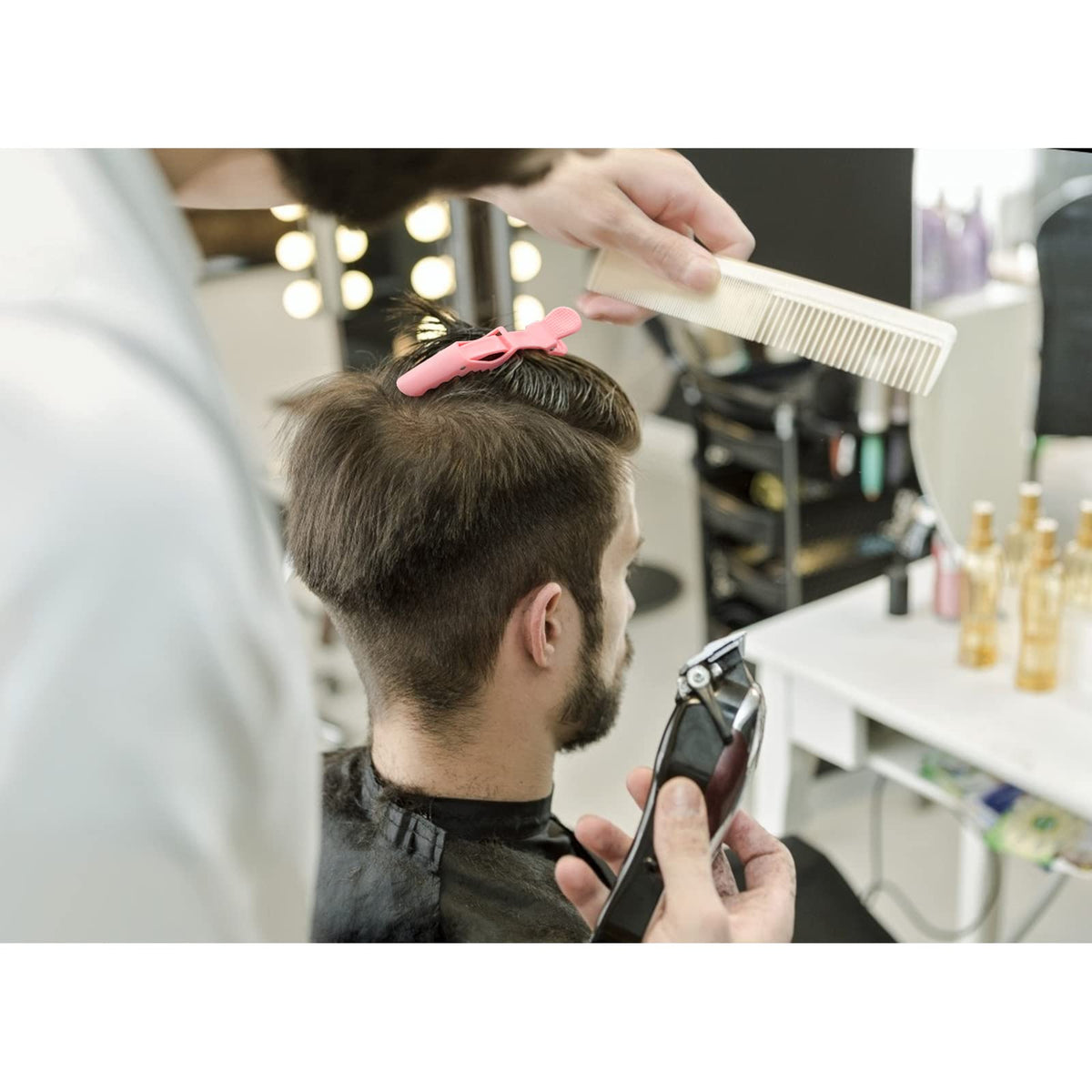 ondder clips securing foil during hair coloring for neat section control