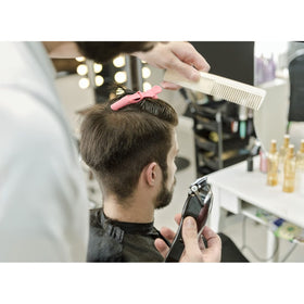 ondder clips securing foil during hair coloring for neat section control