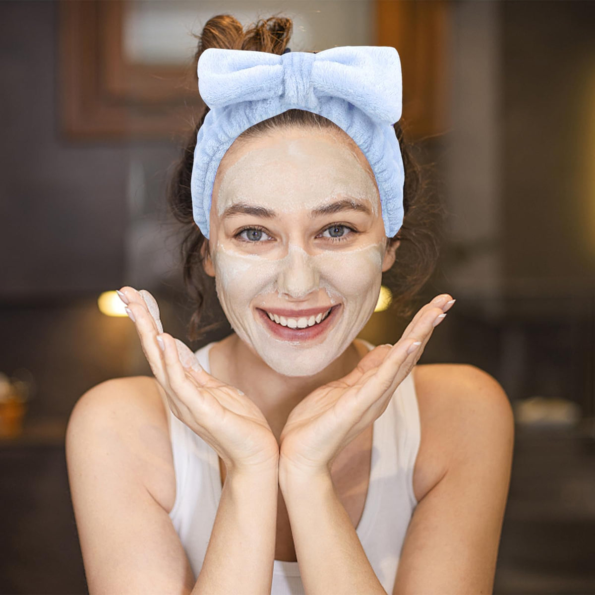 Ondder headband next to hand shows compact size and portability