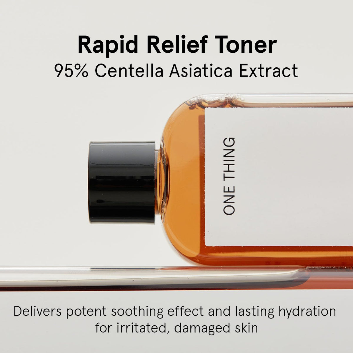 ONE THING bottle open with toner pouring to show lightweight, fast-absorbing formula