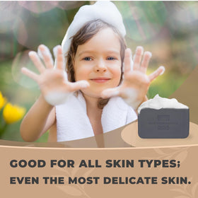 One With Nature ingredients display with Dead Sea salt and charcoal showing mineral benefits