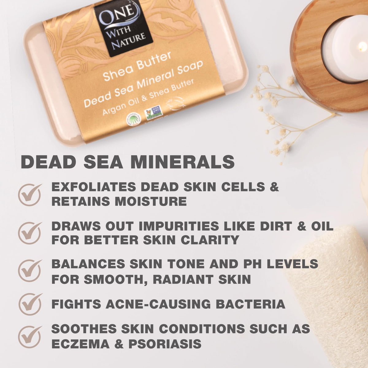 One With Nature soap bar in hand for scale showing compact 4oz size and easy handling benefit