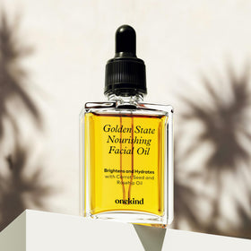 onekind bottle on nightstand suggesting bedtime use and overnight nourishment
