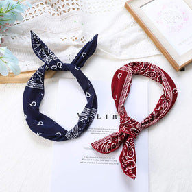 ONEYE twisted bow style demonstrating flexible shaping for fashion versatility