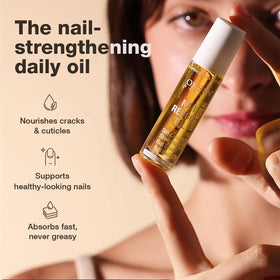 Onsen Secret dropper releasing clear oil to show controlled, mess-free dispensing