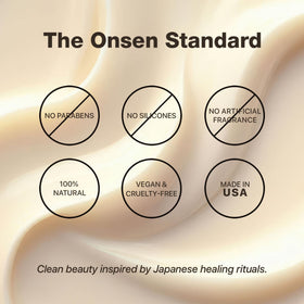 Onsen Secret tsubaki oil bottle with flower to emphasize nourishing botanical ingredient benefits