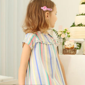 Ooosonlu toddler wearing a clip in side hair illustrating secure, comfortable fit