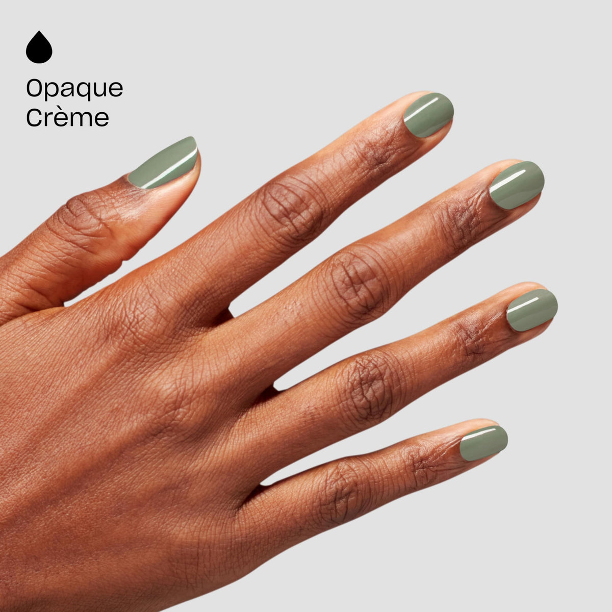 OPI bottle next to fingers for size and scale, showing easy-at-home application benefit