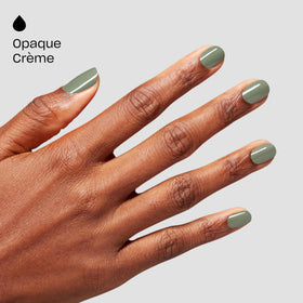 OPI bottle next to fingers for size and scale, showing easy-at-home application benefit