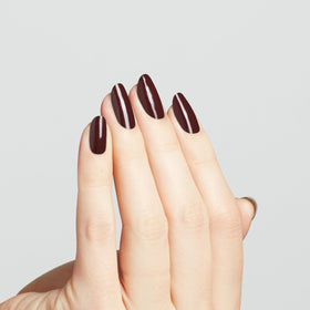 OPI Complimentary Wine applied on nails showcasing salon-quality finish