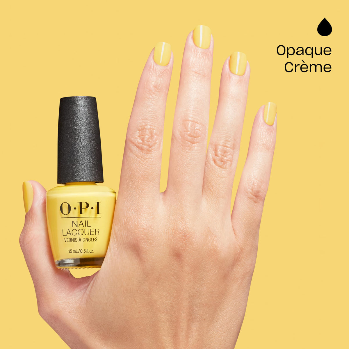 hand holding OPI Daffodil Duck Walk bottle showing true size and easy-grip brush