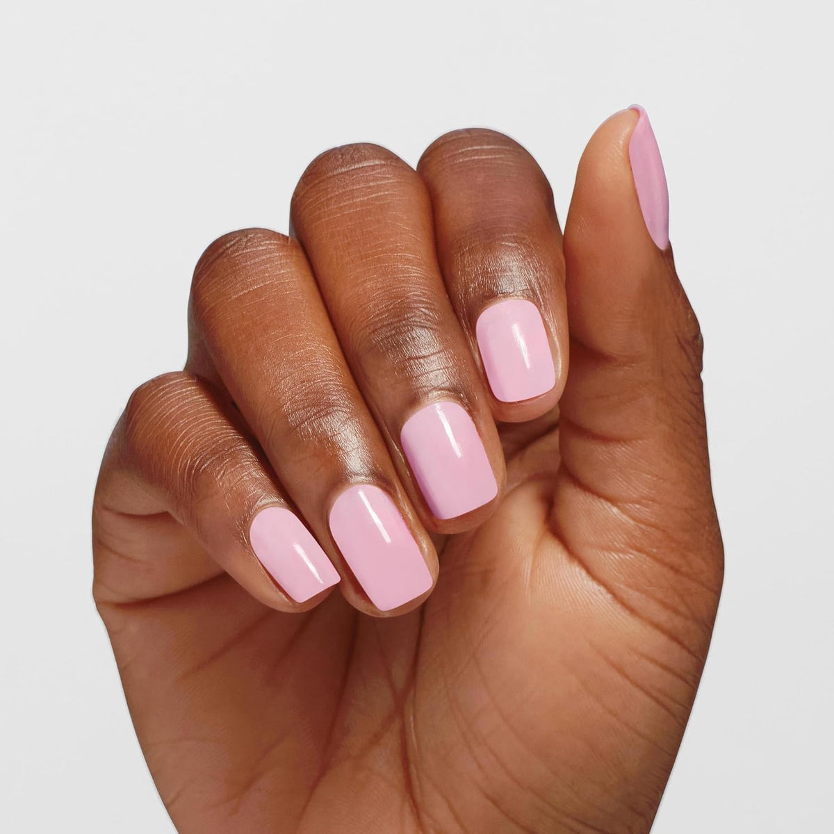 OPI bottle in hand during application demonstrating ease of home use and salon-like finish
