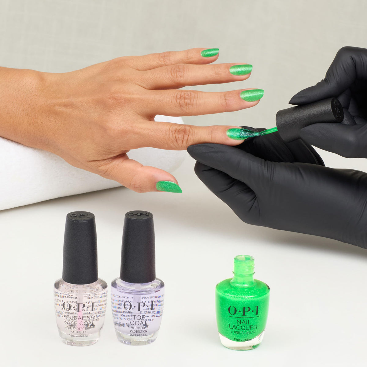 OPI manicured hands at festival showing lively lime color and durable finish