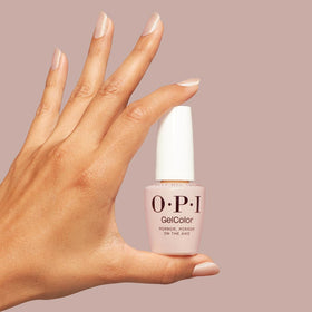 OPI bottle next to a hand for scale highlighting the 0.5 fl oz professional size