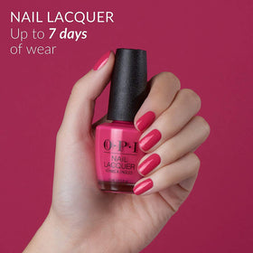 OPI on model hand showcasing wearable pink and neat polish benefit