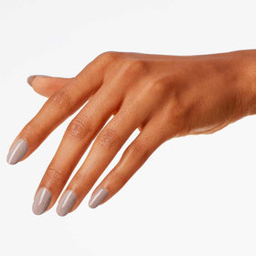 OPI bottle next to top coat illustrating high-shine finish