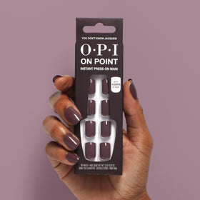 OPI lifestyle photo of finished manicure on hands showcasing natural taupe elegance