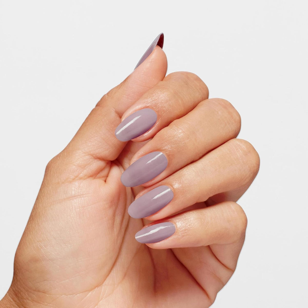 OPI polish being applied to nails showing easy home application benefit