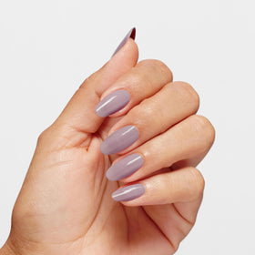 OPI polish being applied to nails showing easy home application benefit