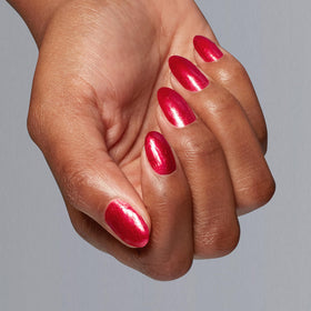 OPI Kiss My Aries applied on hands in studio showing salon-quality shine