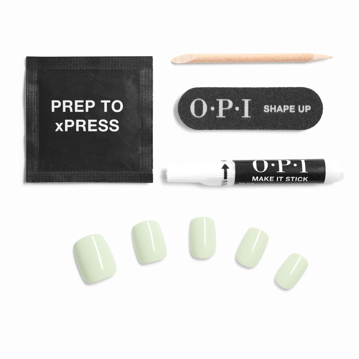 OPI glue bottle and label next to tips illustrating included adhesive and instructions