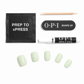 OPI glue bottle and label next to tips illustrating included adhesive and instructions
