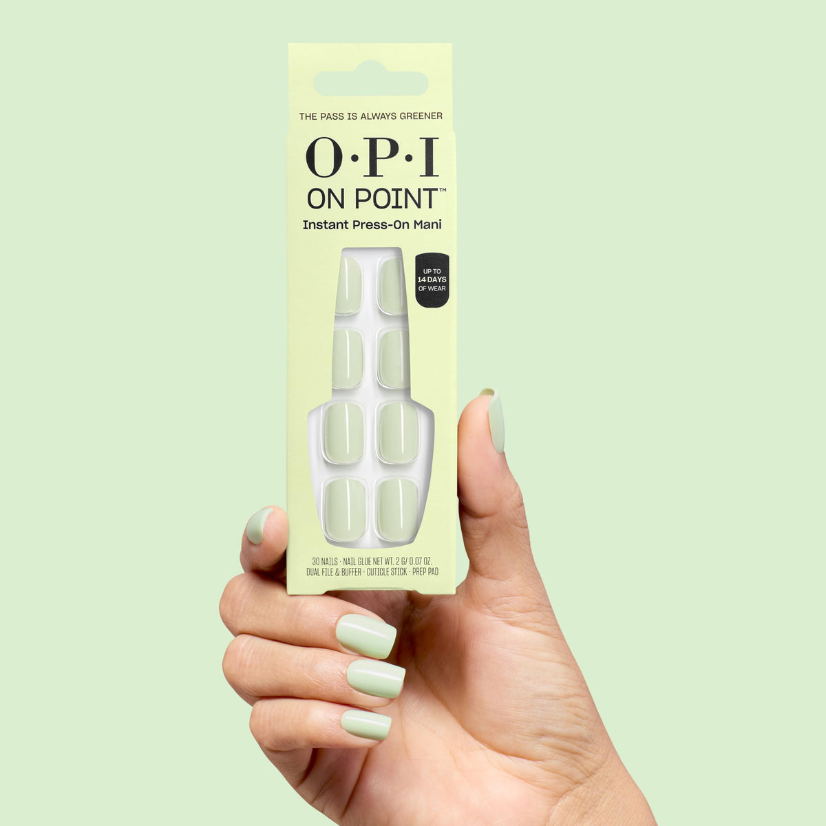OPI press-on nails styled with spring outfit showing high-impact color for outfits