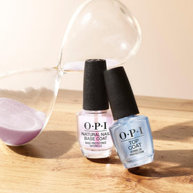 OPI bottle staged with manicured hands showing polished results and style