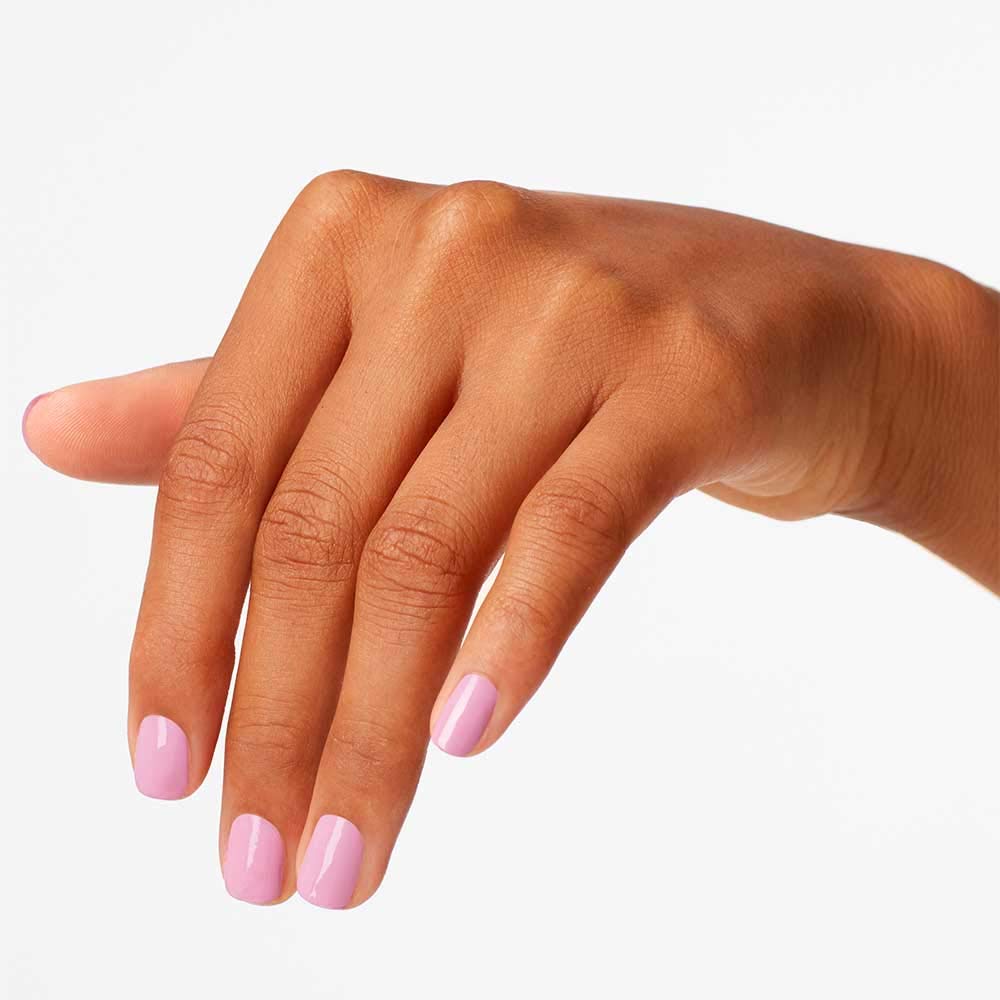 OPI bottle on tabletop highlighting Lucky Lucky Lavender glossy shine and label