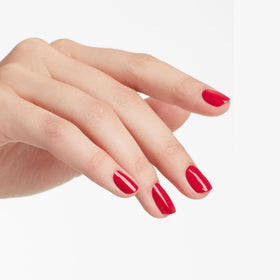 OPI swatch on wrist showing Madam President true color payoff and coverage benefit