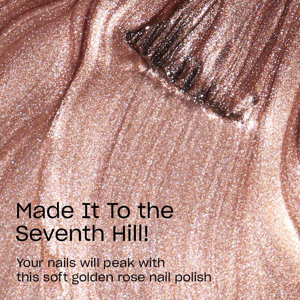 OPI swatch on manicured nails showing buildable bronze-rose color benefit