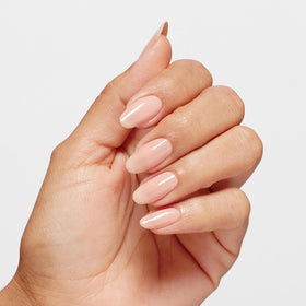 OPI bottle next to ruler showing product size and travel-friendly benefit