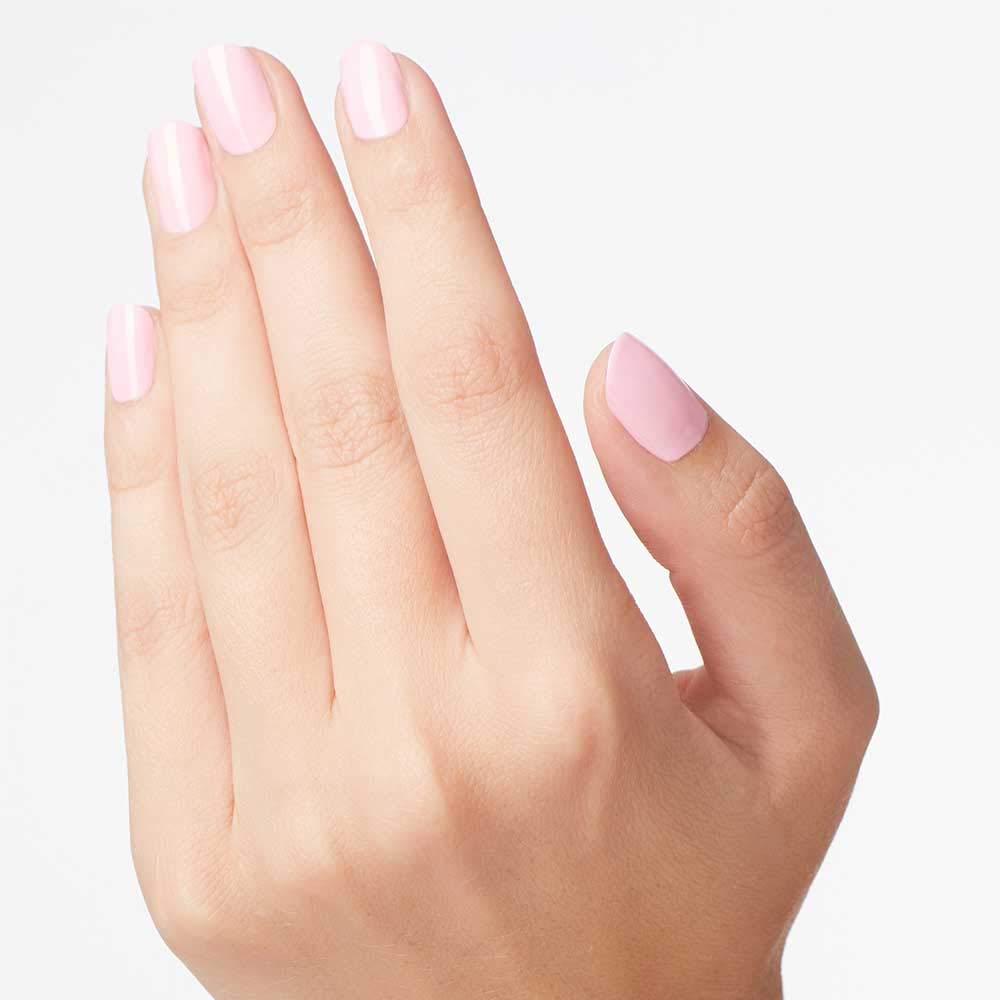 Hand applying OPI Mod About You for quick application and polished result