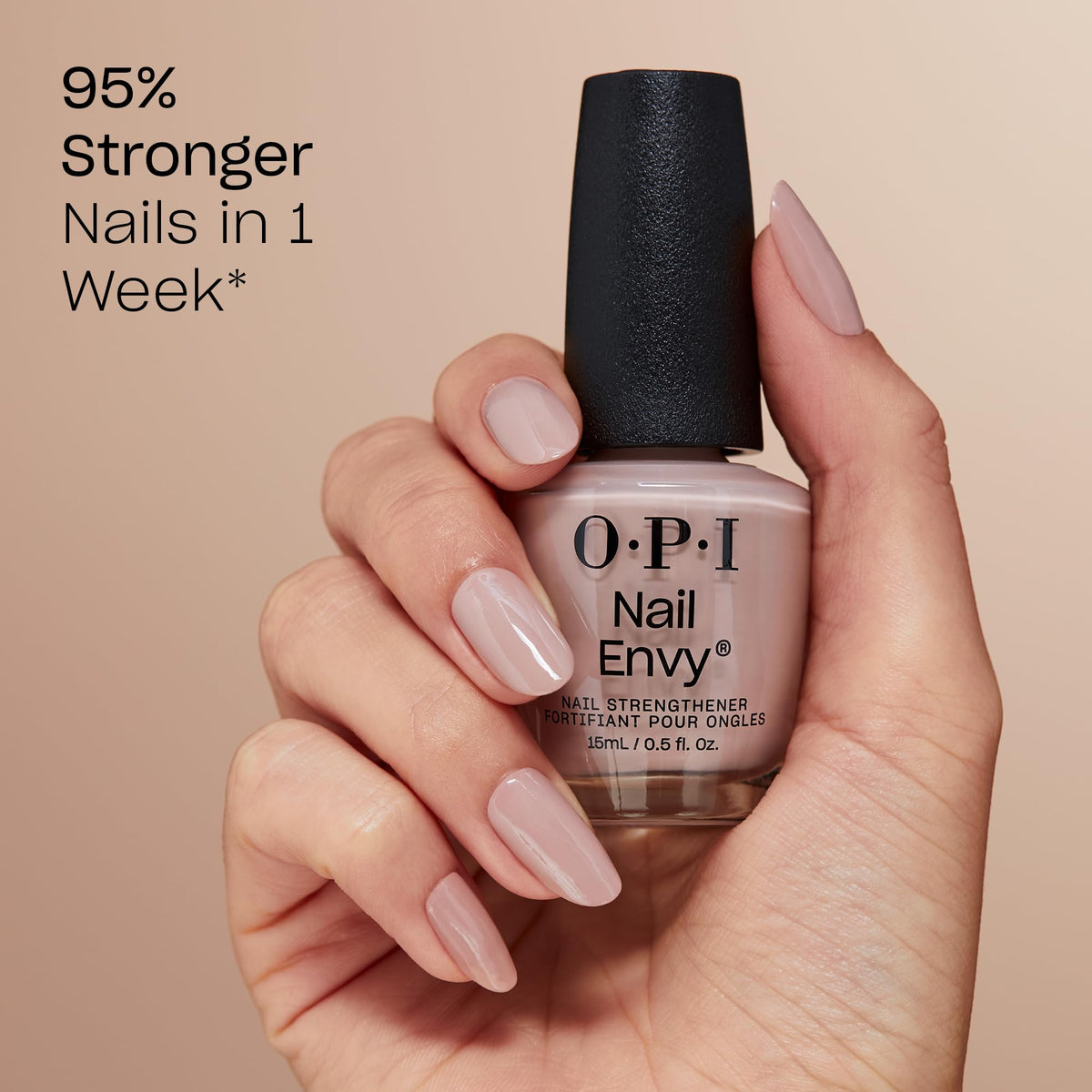 OPI Nail Envy brush applying a thin stroke to demonstrate even coverage benefit