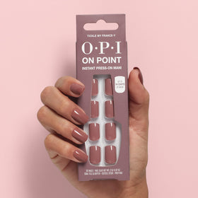 OPI nail glue and basic tools ready for application enabling secure, long-lasting wear