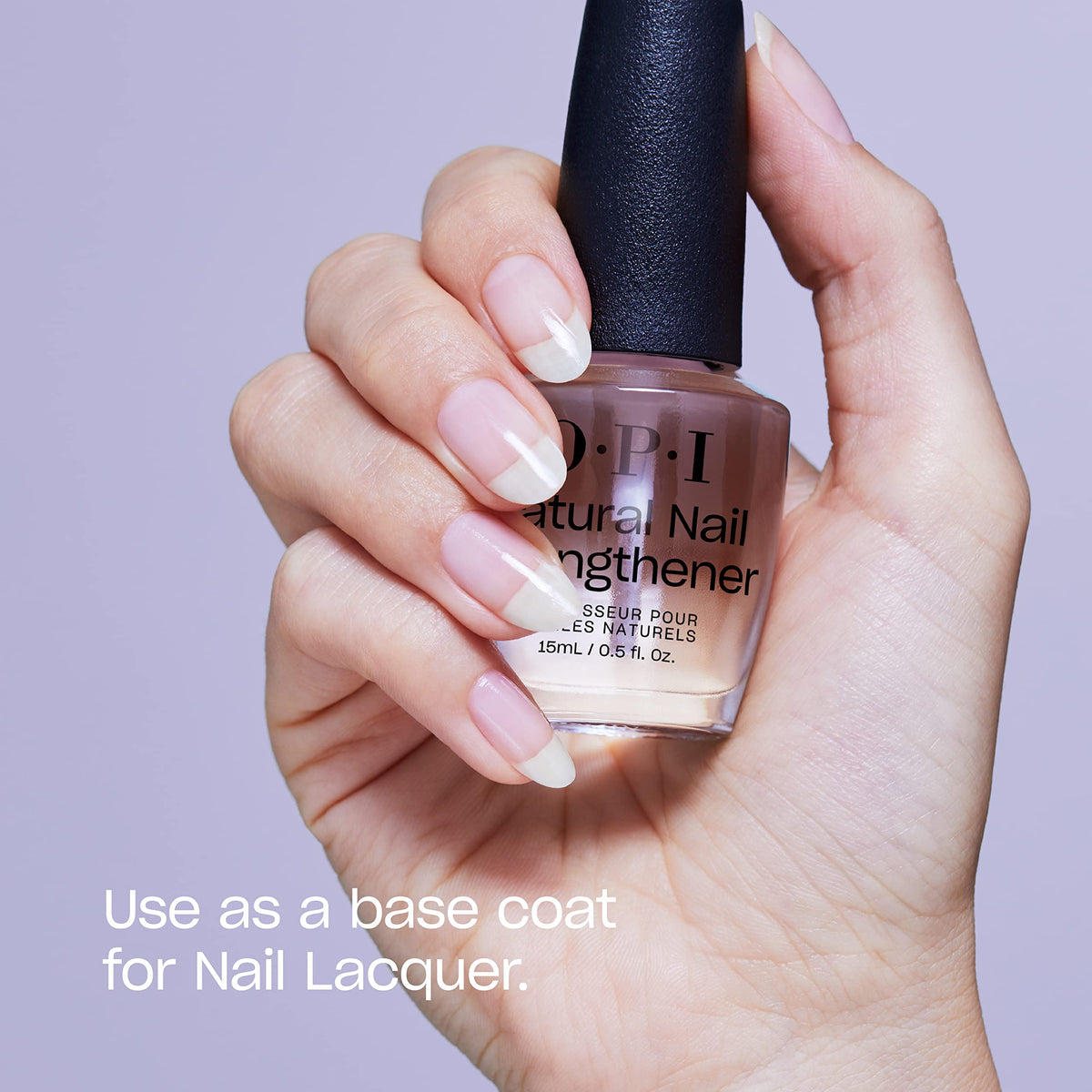 OPI being applied to natural nails demonstrating strengthening benefit