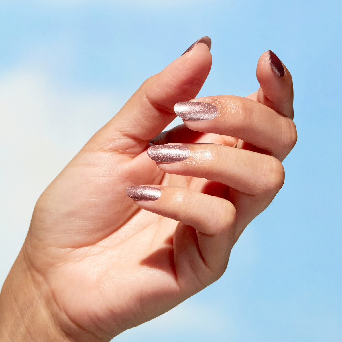 OPI on hand model in lifestyle shot showcasing wearable neutral shimmer