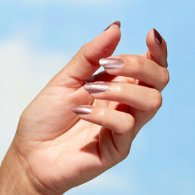 OPI on hand model in lifestyle shot showcasing wearable neutral shimmer