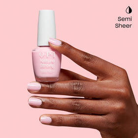 OPI Nature Strong bottle beside coin showing size and scale for user convenience