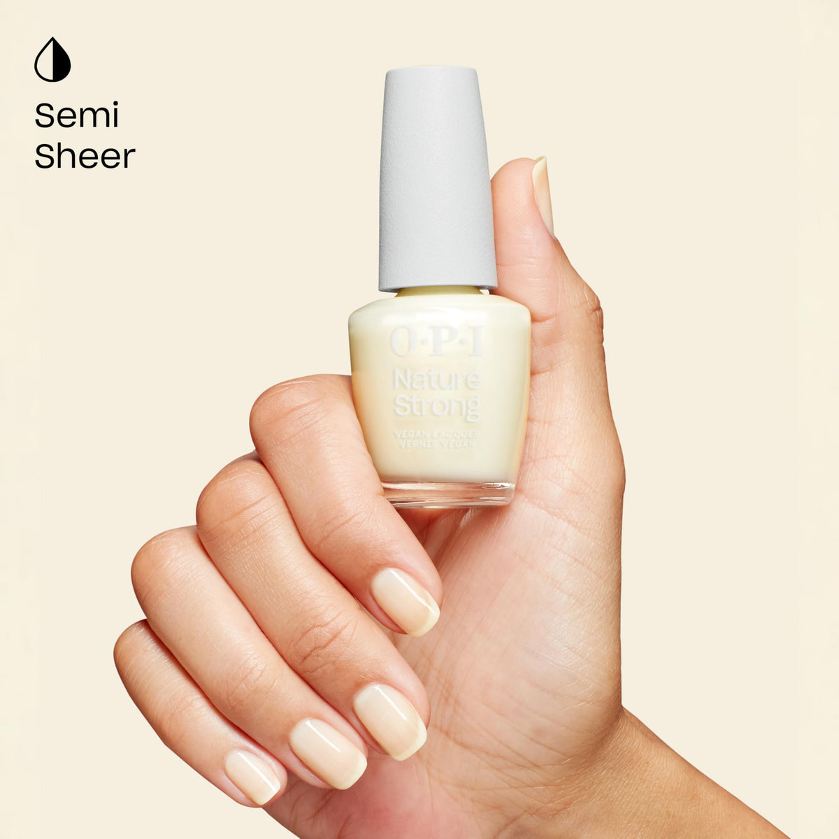 OPI Nature Strong swatch on hand showing warm white crème and natural look