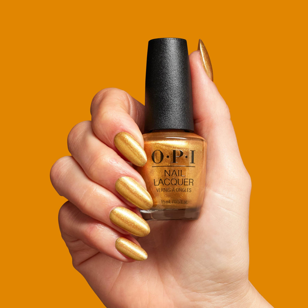 OPI press-on set styled in holiday scene showcasing Nougat by Nature ready-to-wear look