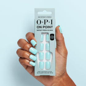 OPI worn on hands in lifestyle setting showing natural look and wearable pastel blue