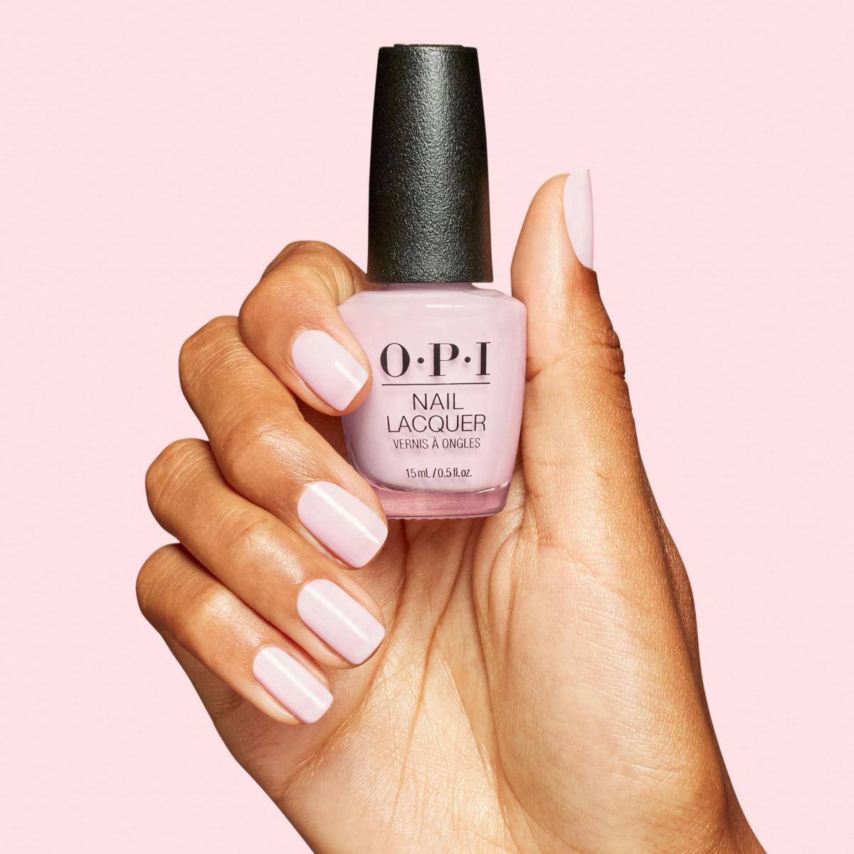 OPI polish bottle held in hand showing true size and scale