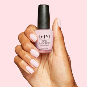 OPI polish bottle held in hand showing true size and scale