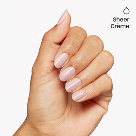 Hand model wearing OPI’m a Bubble Bunny nails demonstrating subtle natural look