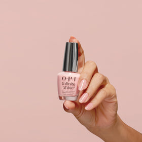 OPI application on hand illustrating smooth two-coat coverage and salon shine benefit